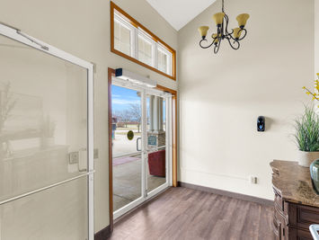 Photos of The Glenwood Assisted Living community common areas such as living room, model bedroom and dining areas.