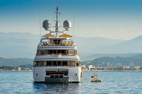 Big white superyacht, view from the stern, anchored in the bay of Cannes, South of France