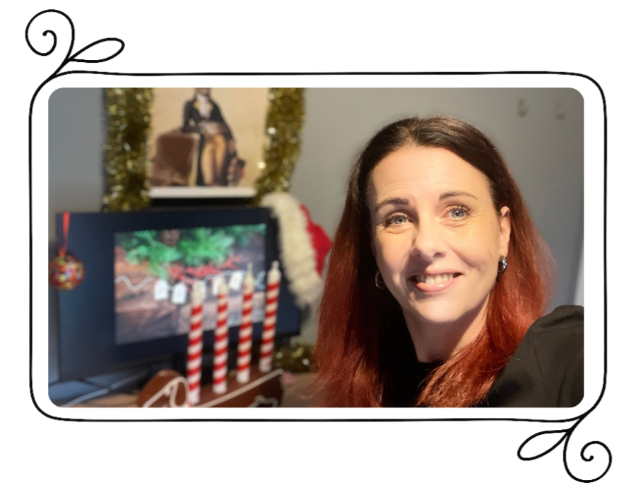 wedish transcreator working at her desk in October, surrounded by Christmas decorations while writing Swedish transcreation for Christmas campaigns.