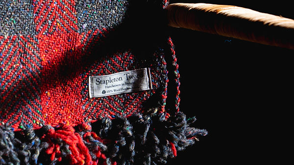 A traditional handmade Irish throw, made with red and black wool