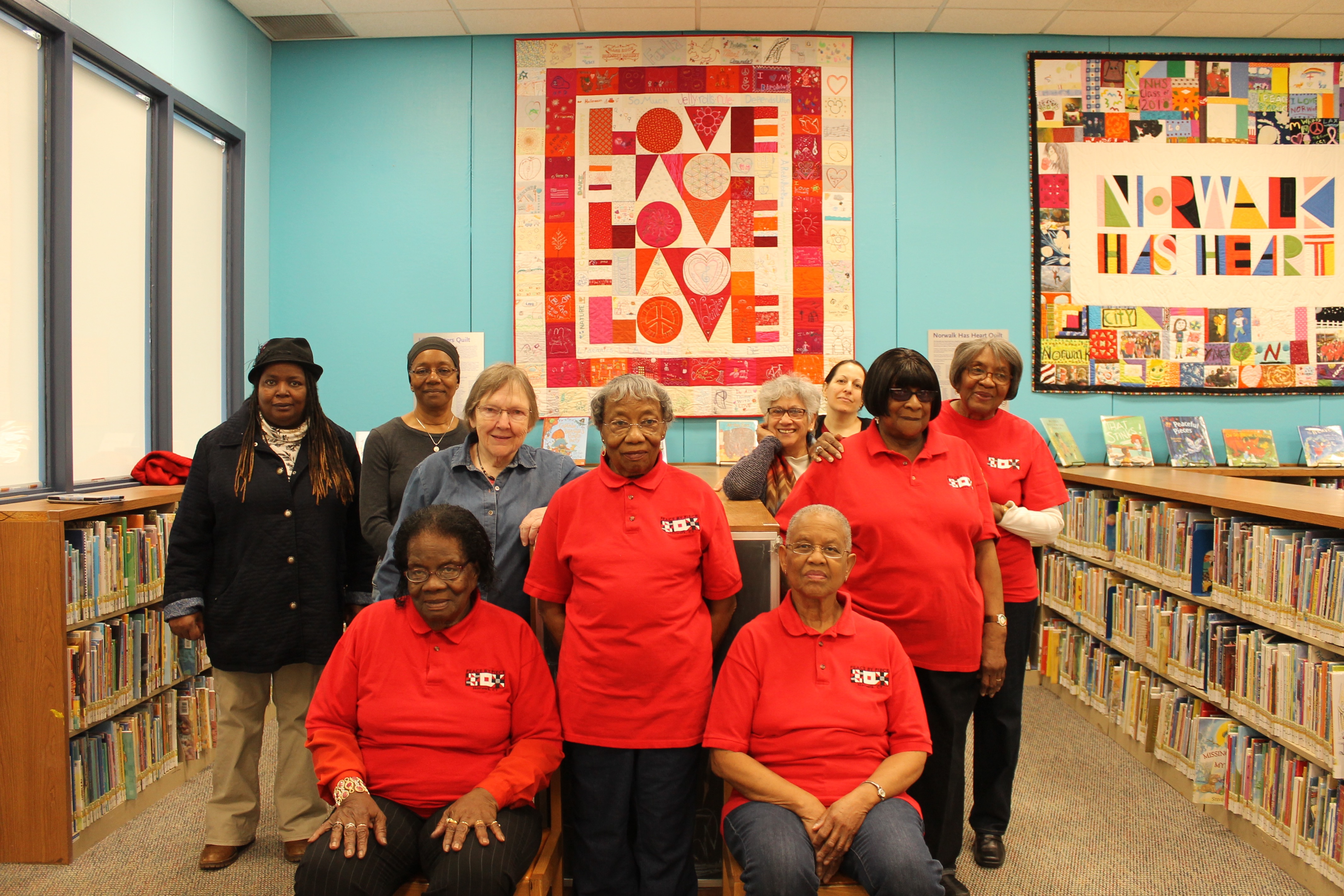 Mentors in front of LOVE quilt