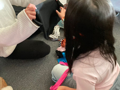 Children designing with scraps