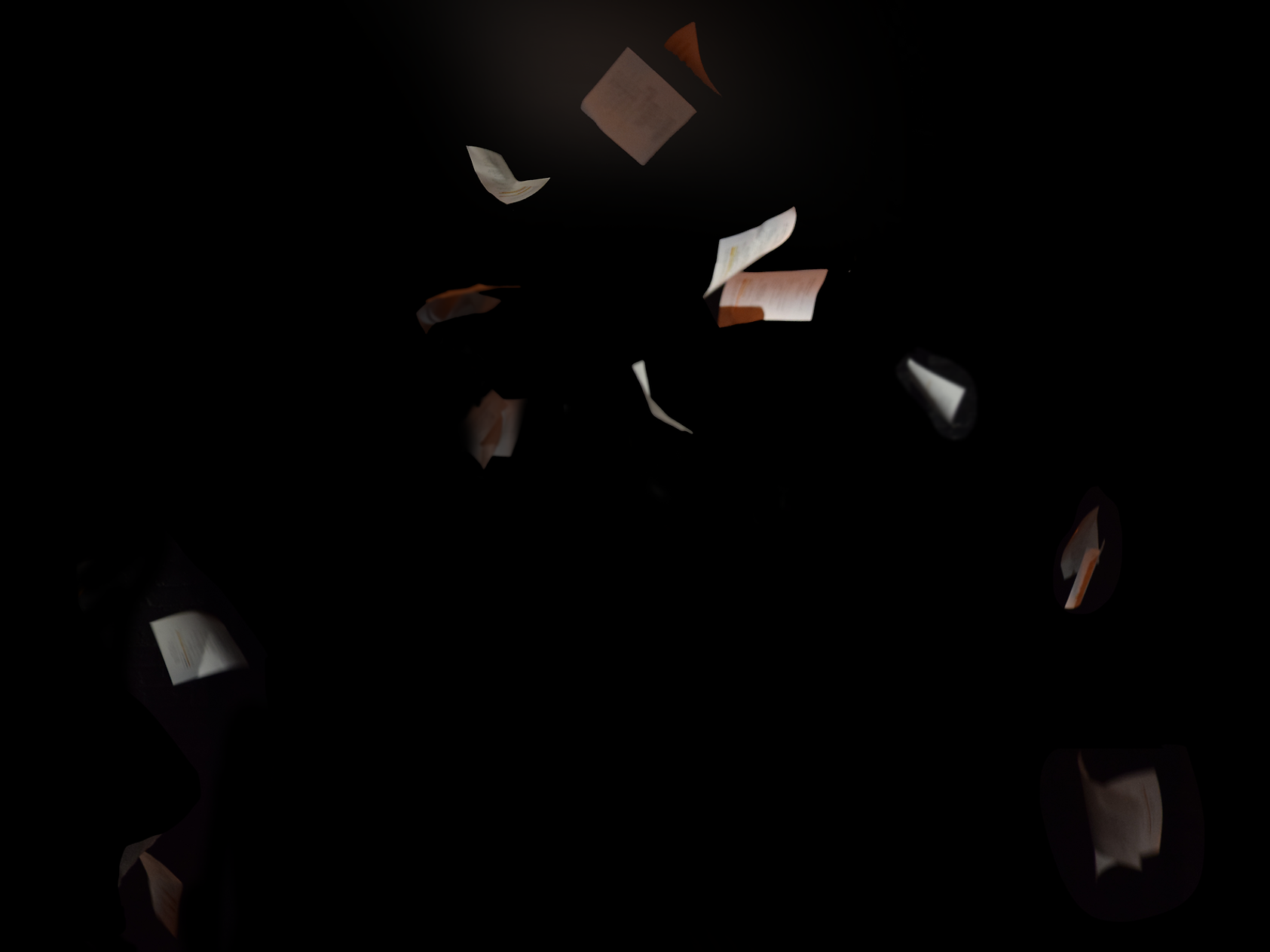 Script pages falling in the air on black background