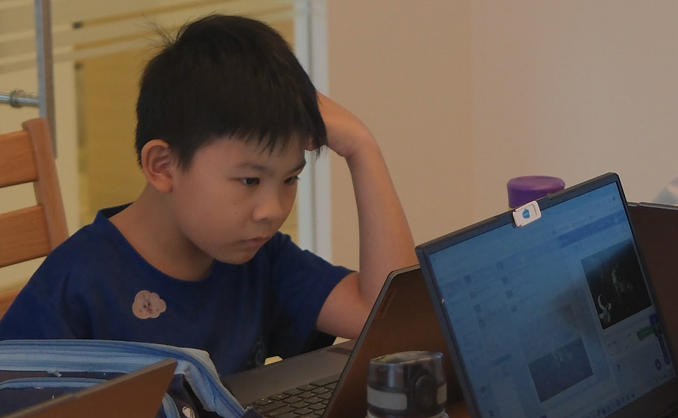 Kyler busy racking his brain in the Lyza Scratch Challenge