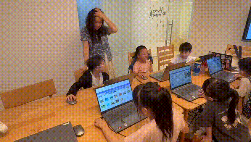 Teacher Renae assisting students