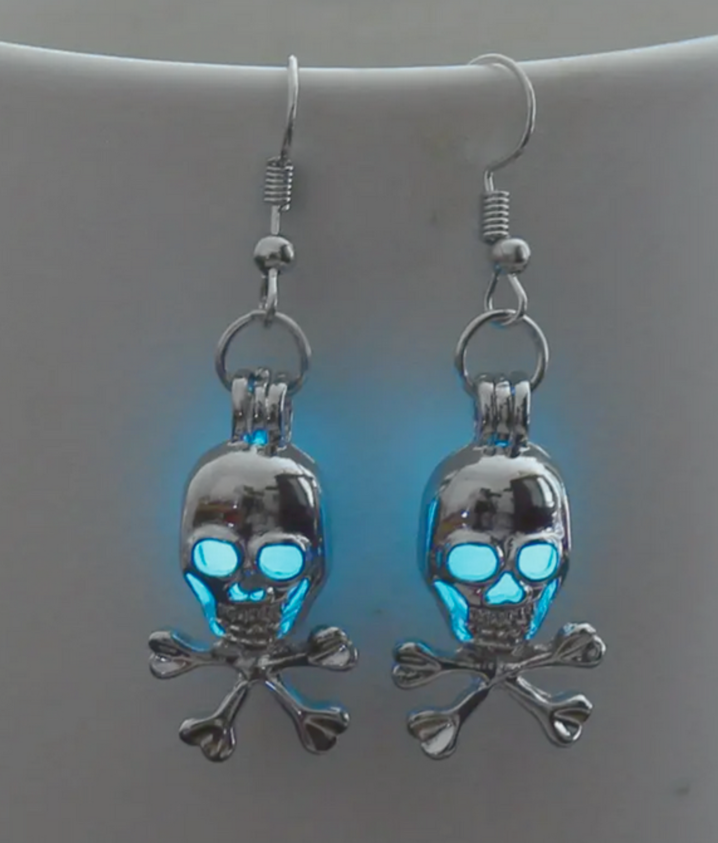 Boucles d'oreilles crânes phosphorescent
