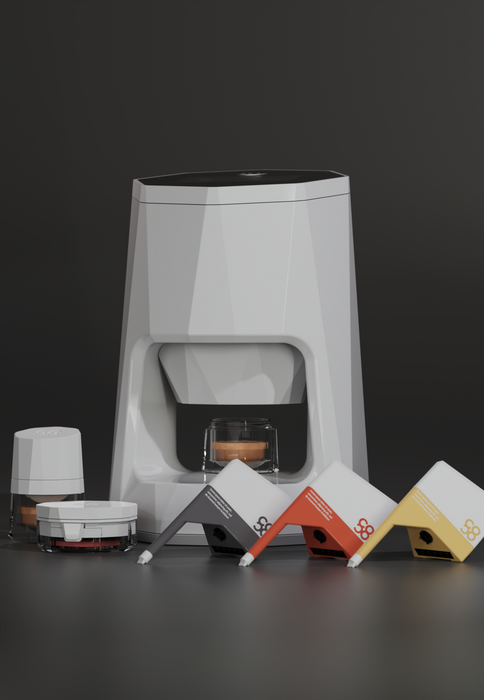 Starter kit on black background: device, cartridges, and containers.