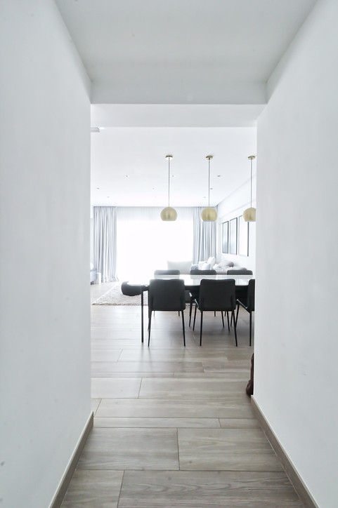 premium leather dining chairs, contemporary brass pendant lights, modern marble extendable dining table, premium oak flooring