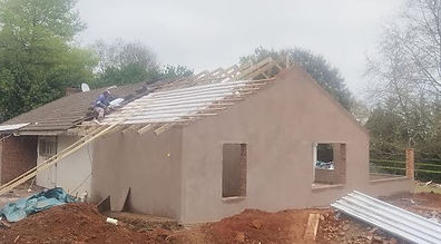 star half house worker doing roof.JPG