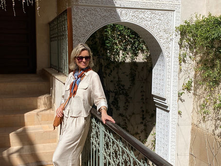 woman standing on balcony