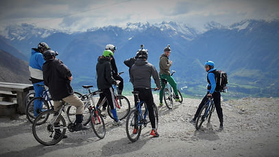 biking towards bovec in ski bike rafting event