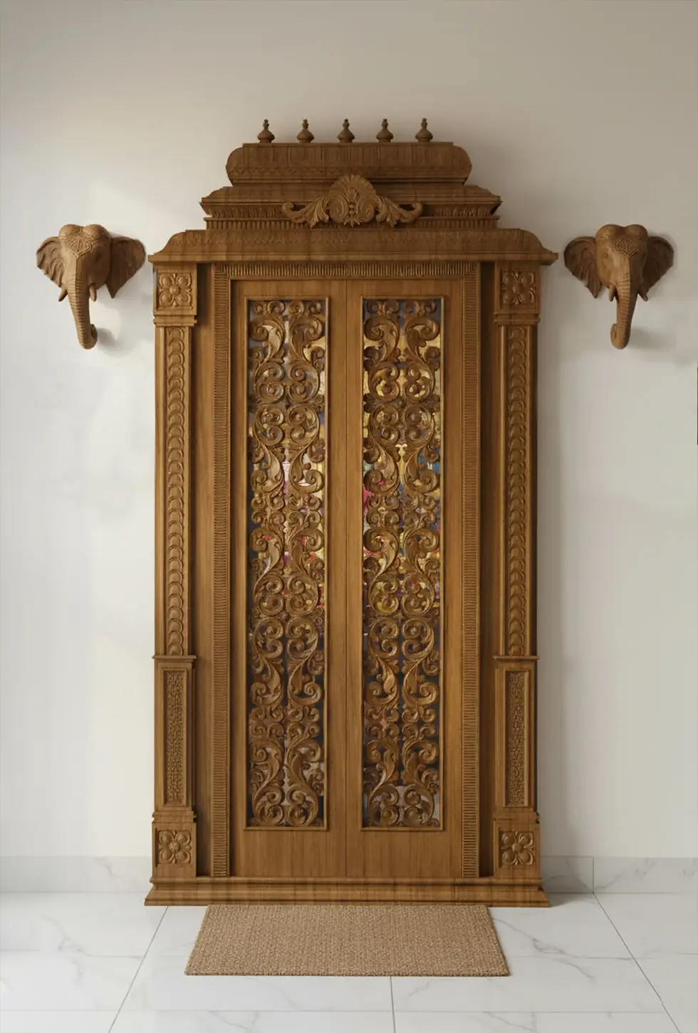 flat pillars with wooden door and frame along with elephants and gopuram