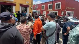Riña en mercado de San Pedro Cholula por presunto cobro de piso; detienen a nueve personas