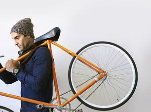 Man Holding Bicycle