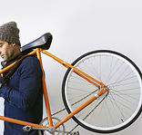 Man Holding Bicycle