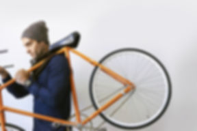 Man Holding Bicycle
