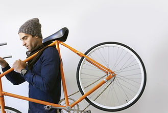 Man Holding Bicycle