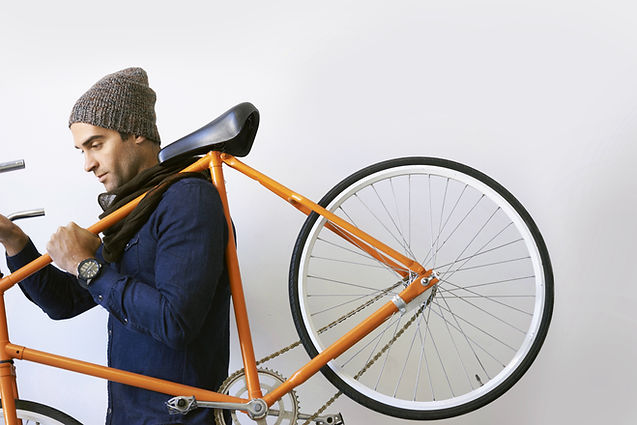 Man Holding Bicycle