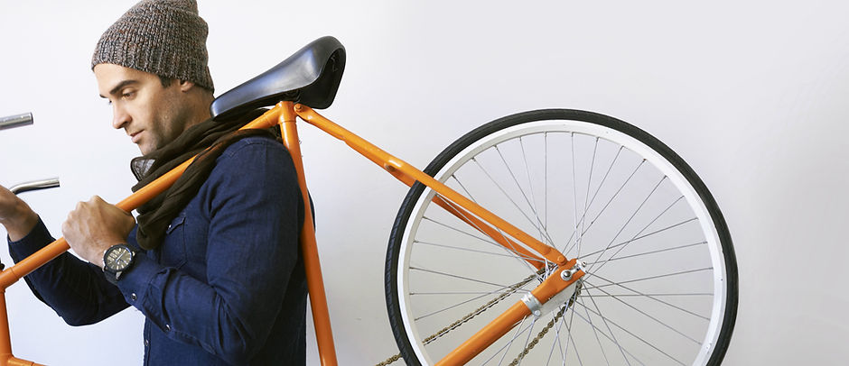 Man Holding Bicycle