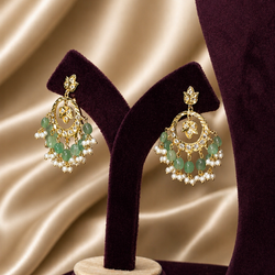 Gold Jadau earrings with green beads & pearls