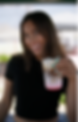 girl holding raspberry white chocolate latte