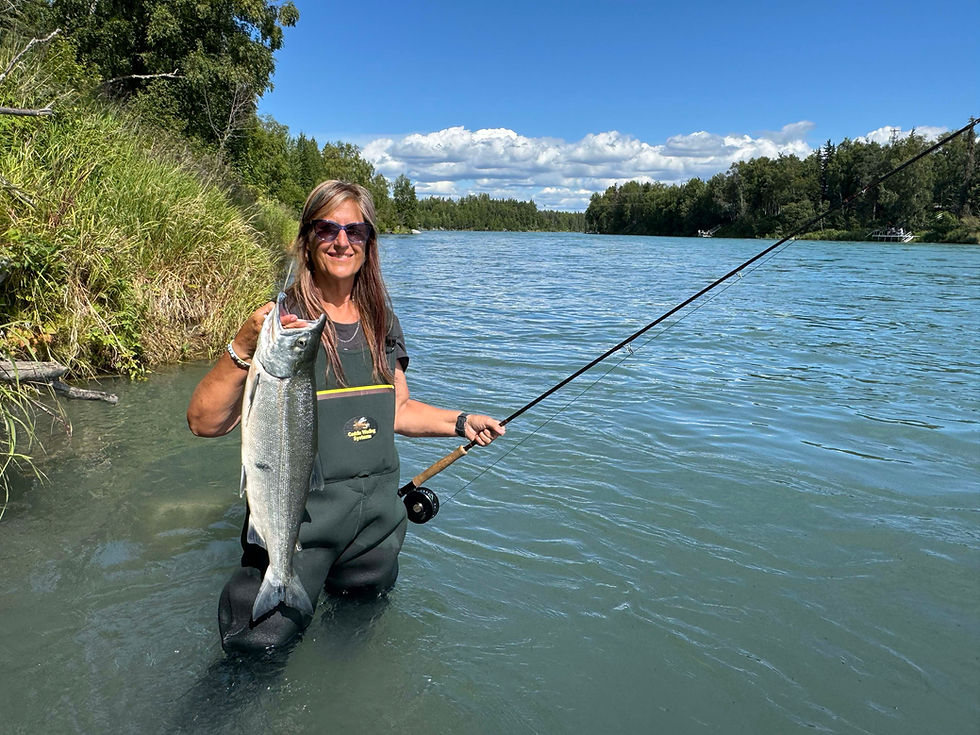 Woman-fishing-salmon-Kenai-River-Suites-11