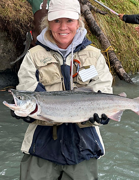 Woman-fishing-salmon-Kenai-River-Suites-2.jpg