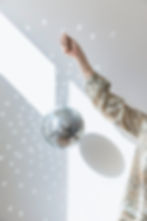new-year-party-concept-with-girl-holding-disco-ball.jpg