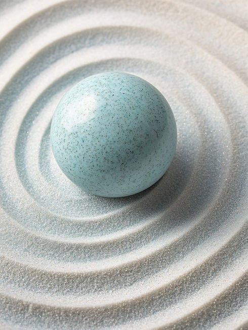 aquablue-ball-surrounded-by-pale-blue-sand.jpg