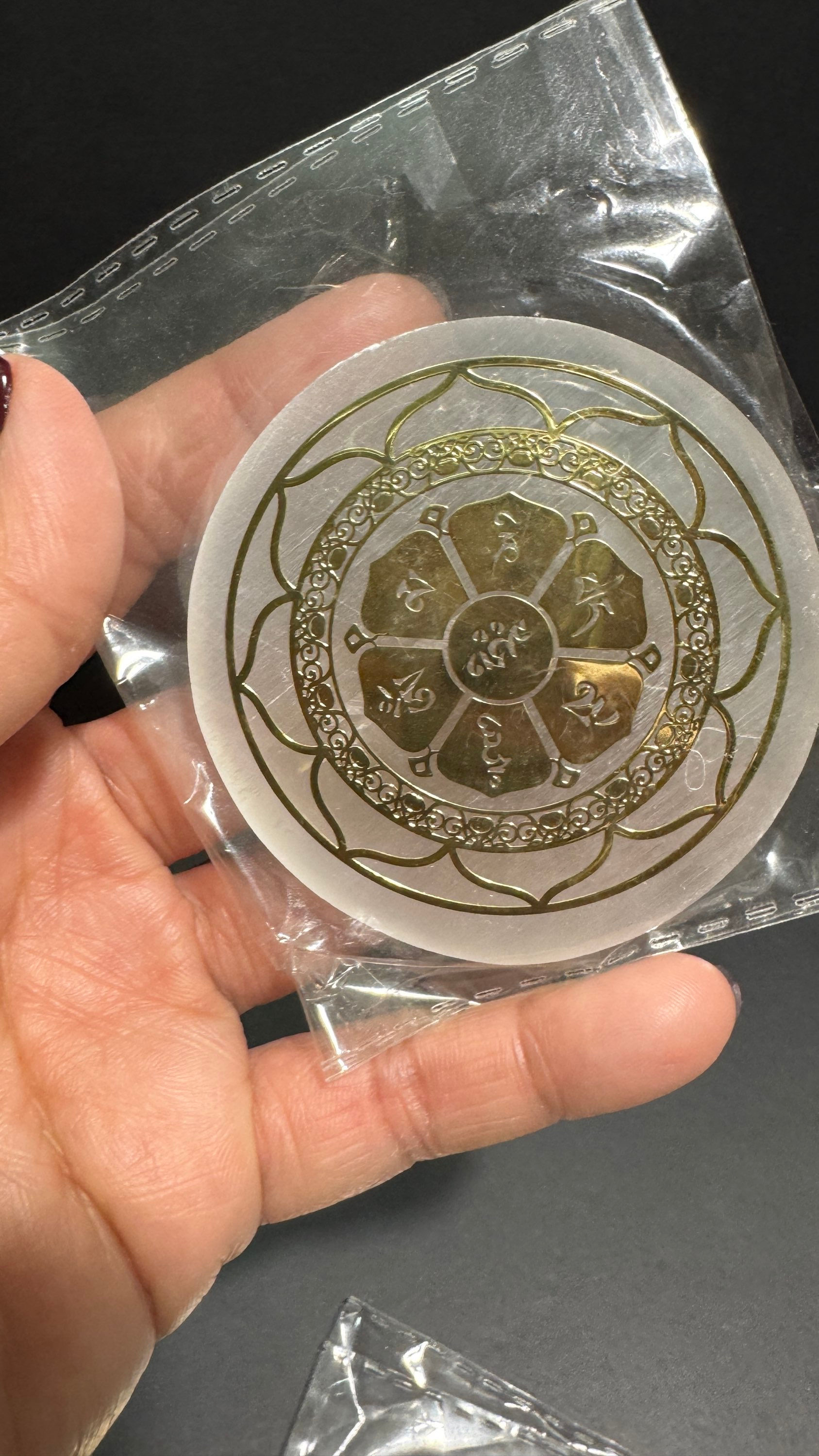 Selenite sating spar smal plate with desig 2.5” diameter