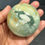 Thumbnail: Caribbean Calcite sphere with glass holder 280grams 58MM diameter 