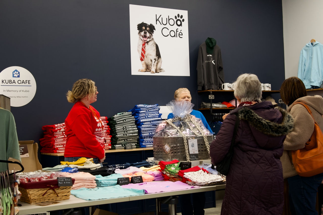 Humane Society London & Middlesex volunteer at the winter sweater stall during Winter Wonderland event in London, Ontario