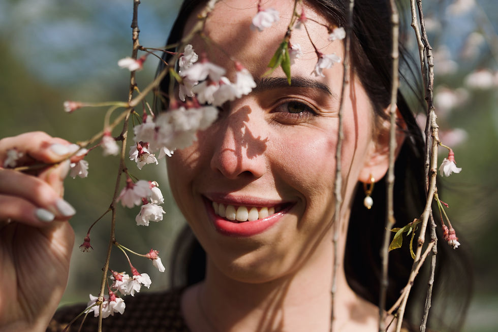 Dreamy spring portrait photography session in London Ontario with pastel tones and outdoor natural scenery at springbank park