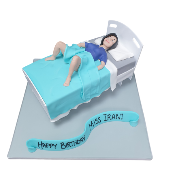 Delicious and visually stunning cake designed to resemble a gynecology bed in a hospital setting, perfect for themed parties and events.