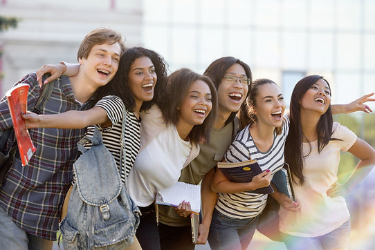 multiethnic-group-young-happy-students-standing-outdoors.jpg