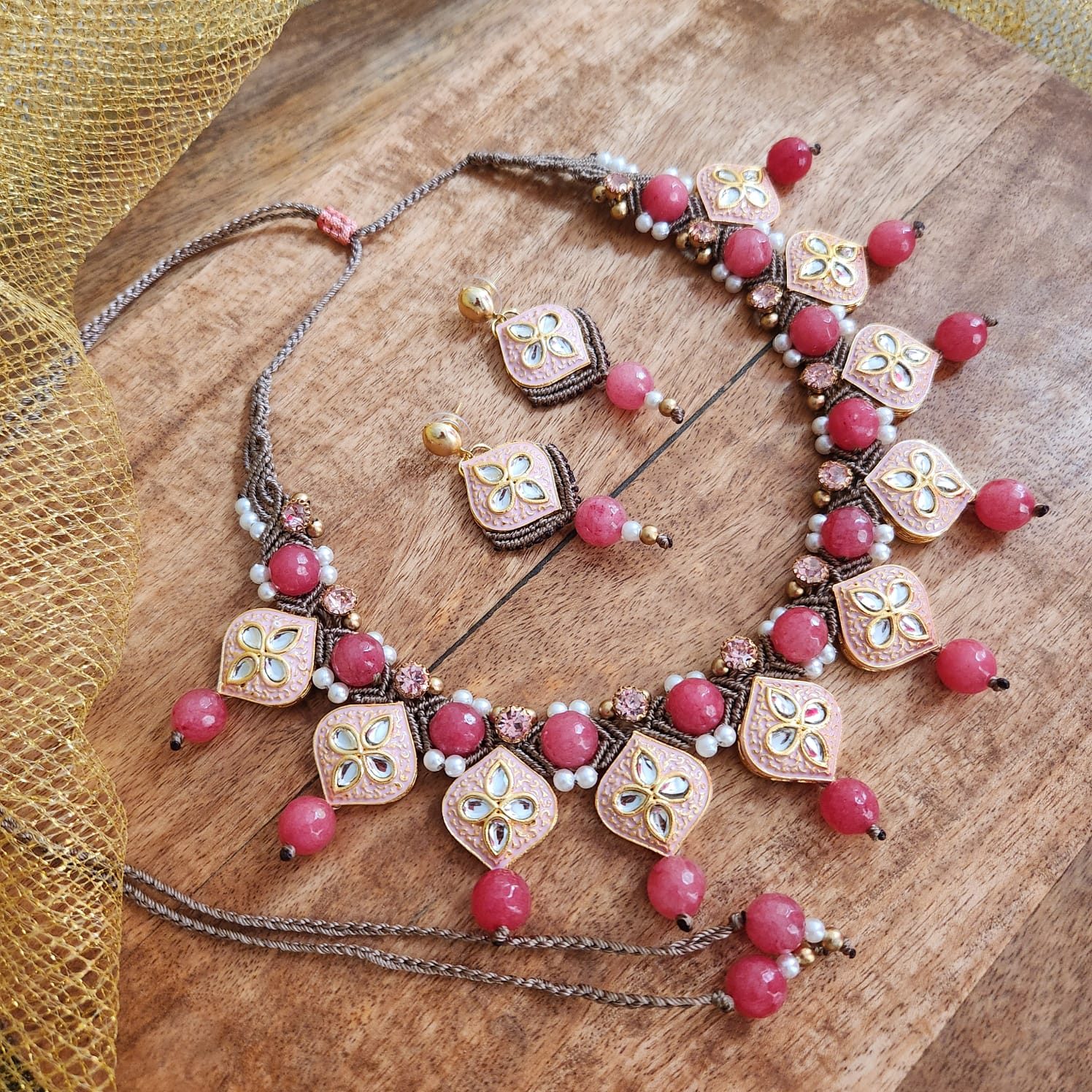 At The Yarn Artisan Store, I create macrame jewellery with contemporary raw materials (meenakari elements in this case) to create traditional and contemporary designs.