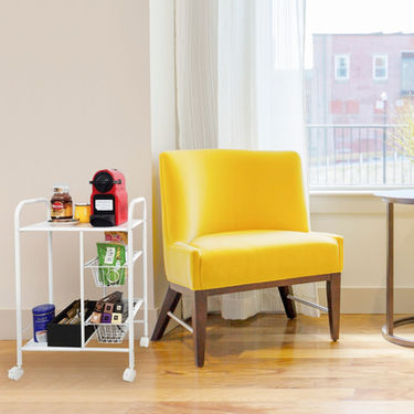 Rolling utility serving cart with multiple tiers for transporting food, drinks, or supplies in kitchens or dining areas