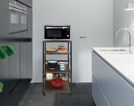 Freestanding kitchen appliance organizer with open shelves for storing cooking equipment and tools