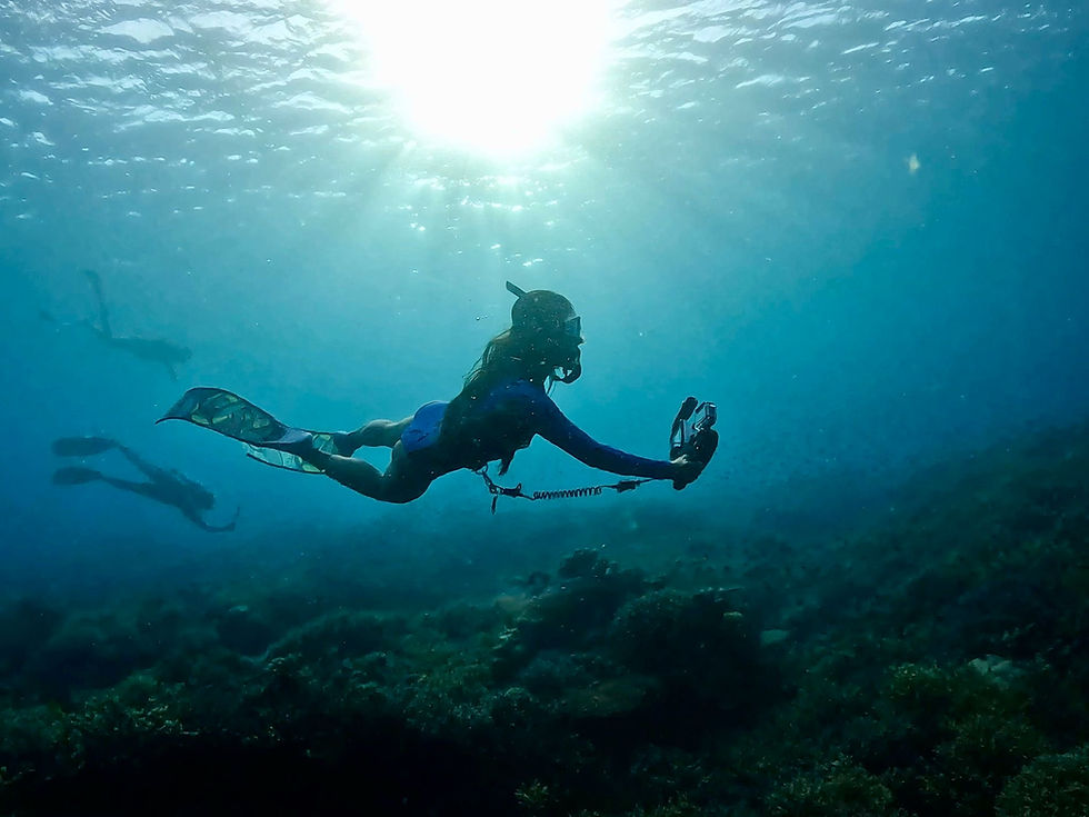 A photo of me freediving and taking photos, I love using my own references, and underwater photography has grown into a serious hobby of mine.
