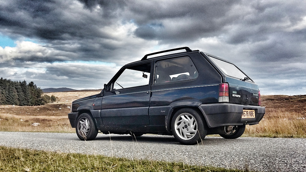 Classic Fiat Panda in black, lowered, Punto Sporting engine.