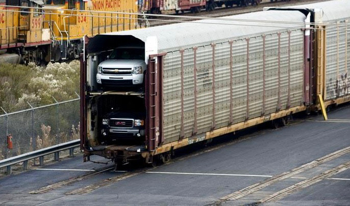 Stock photo of GM truck shipment by rail