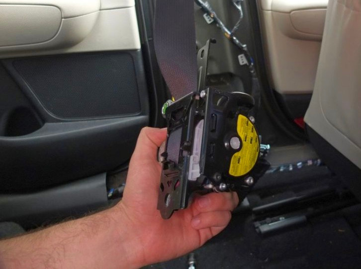 Stock Photo of seat belt retractor