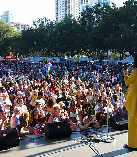 DJ L Mo & Company performing a large scale festival in Tampa Bay.