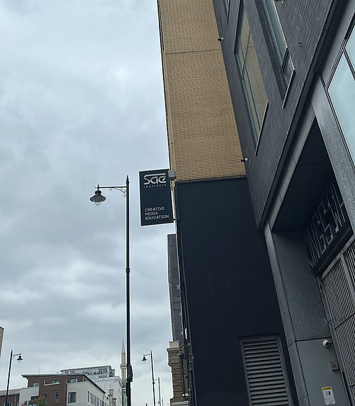 SAE Institute London logo displayed on the exterior of the university building.
