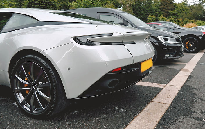 aston martin car in a parking space after being valeted