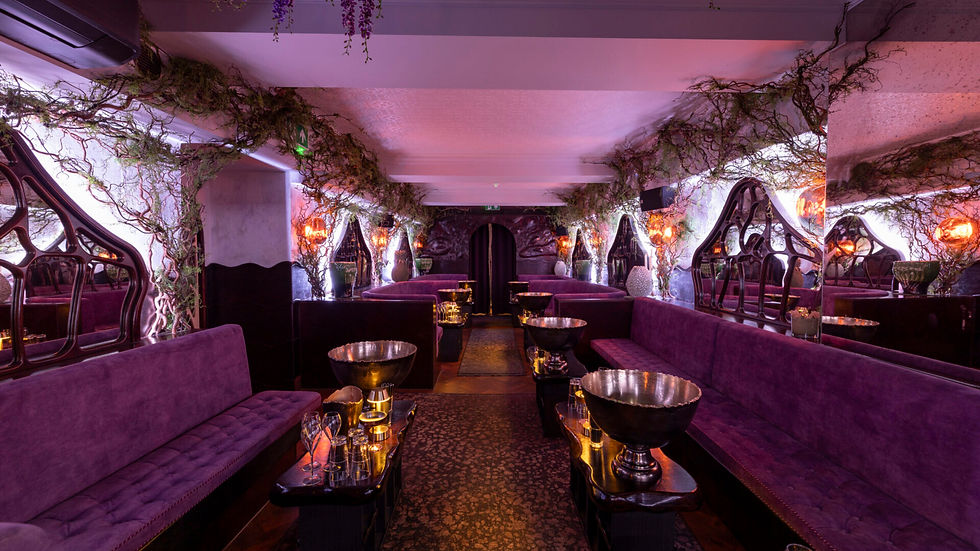 Rex Rooms Club Chelsea tables inside one of the club's rooms.