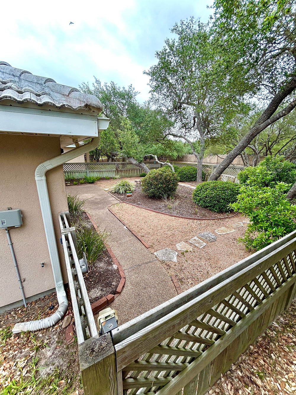 Lawn and landscape after grass fed mowing in Rockport Texas
