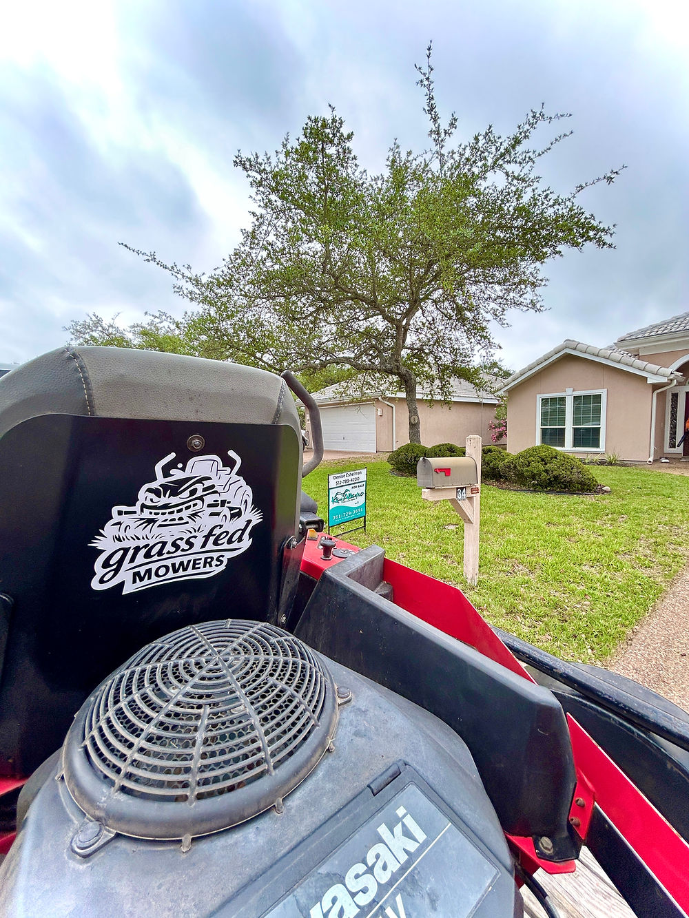 Grass Fed Mowing Rockport Texas mower at a residential yard
