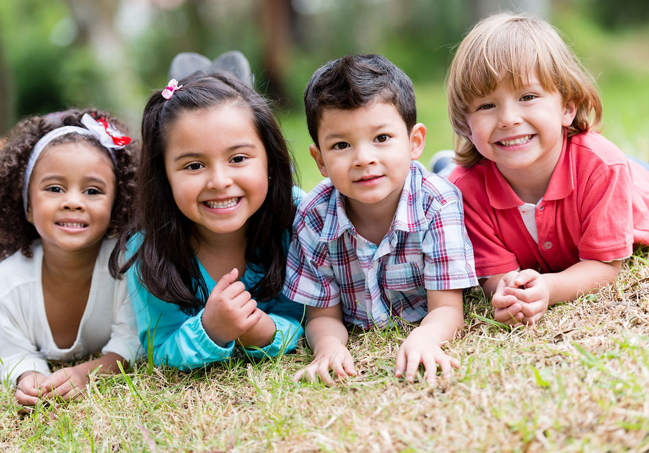 Happy group of kids playing at the park .jpg