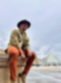 Dr. Starr Astacio, PhD, LMFT, smiling outdoors near the Louvre in Paris, reflecting his curiosity, cultural openness, and life beyond clinical practiceDr. Starr Astacio, PhD, LMFT, smiling outdoors near the Louvre in Paris, reflecting his curiosity, cultural openness, and life beyond clinical practice